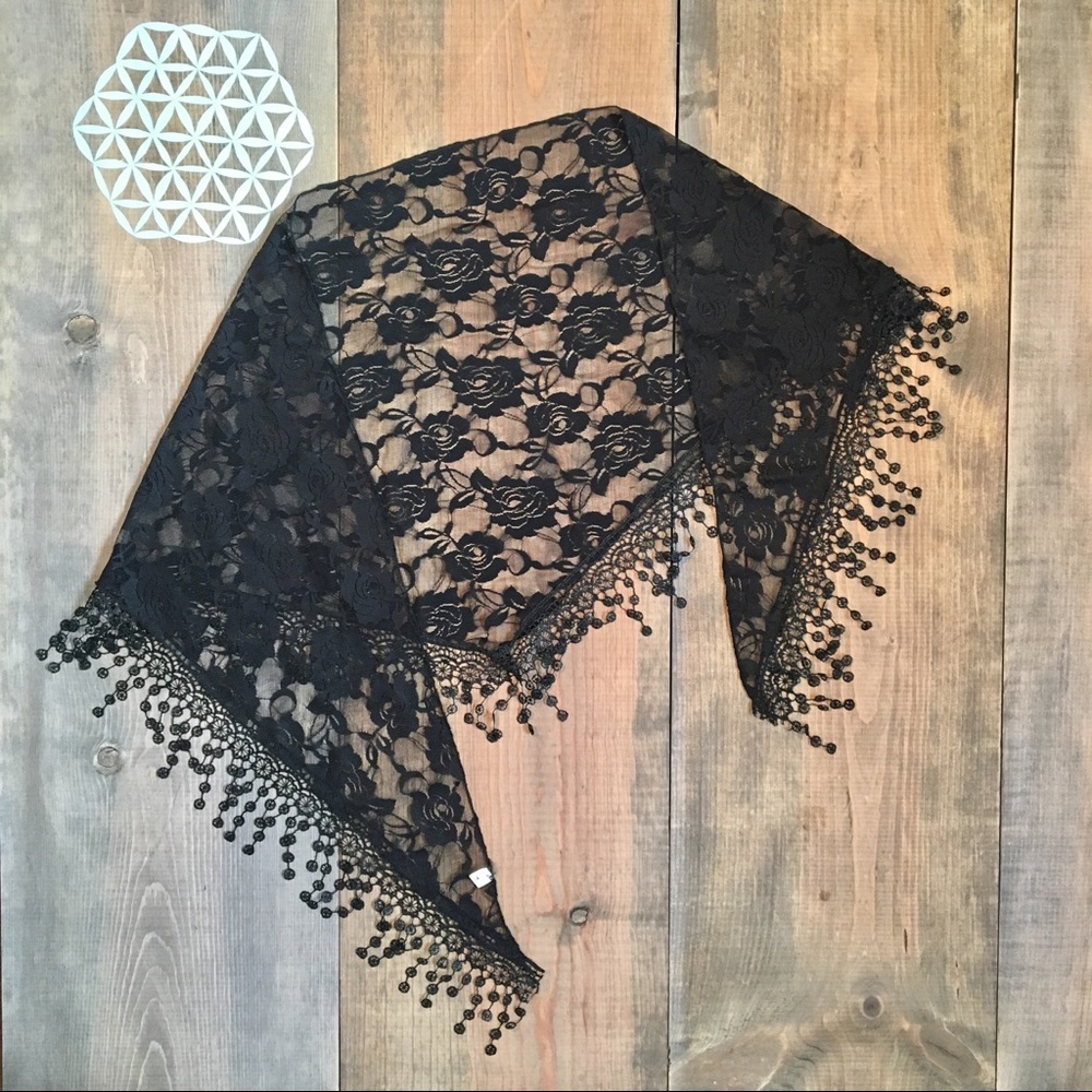 Black scarf with light tassels